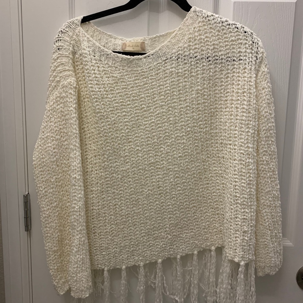 Creamy white sweater from Altar’d State